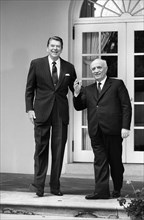 U.S. President Ronald Reagan standing with Italian Prime Minister Amintore Fanfani outside White