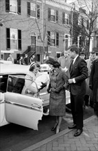 U.S. President-Elect John Kennedy with wife Jacqueline Kennedy as they return to their Georgetown