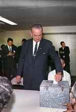 U.S. President Lyndon B. Johnson placing his vote in ballot box, Pedernales Electric Co-op