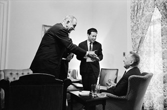 U.S. President Lyndon Johnson with Soviet Premier Alexei Kosygin (seated right) and Kosygin's