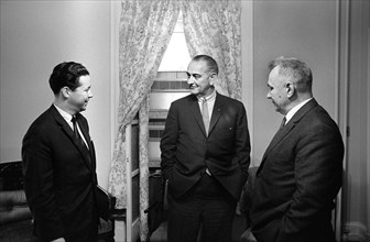 U.S. President Lyndon Johnson (center) with Soviet Premier Alexei Kosygin (right) and Kosygin's