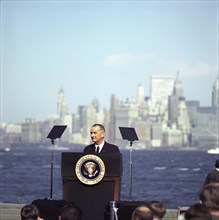 U.S. President Lyndon B. Johnson speaking at podium before signing the Immigration and Nationality