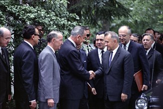 L-R: U.S. Secretary of State Dean Rusk, William Krimer (Pres. Johnson's interpreter), U.S.