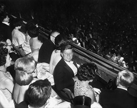 U.S. President John Kennedy and First Lady Jacqueline Kennedy watching Inaugural Ball proceedings,