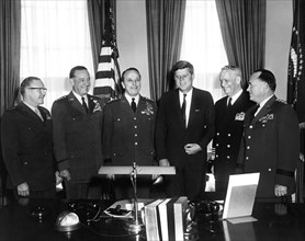 U.S. President John Kennedy (3rd from right) meeting with Joint Chiefs of Staff. (L-R) Commandant