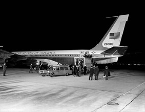 Late U.S. President John Kennedy’s casket being transferred from Air Force One to waiting