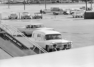 Hearse carrying body of late U.S. President John Kennedy arriving for transfer to Air Force One,