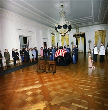 Late U.S. President John Kennedy’s flag-draped casket, First Lady Jacqueline Kennedy, Attorney