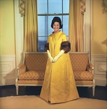 Claudia 'Lady Bird' Johnson, full-length portrait wearing inaugural gown, White House, Washington,