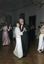 Claudia 'Lady Bird' Johnson and U.S. President Lyndon Johnson dancing at diplomatic reception, East