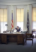 U.S. President Lyndon Johnson at his desk, on telephone, Oval Office, White House, Washington, D.C