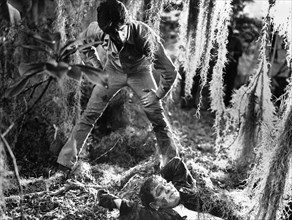 Sam Elliott (standing), on-set of the film, "Frogs", American International Pictures, 1972