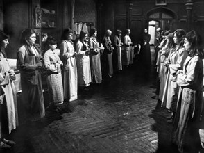 Candida Rosada (standing center between 2 rows of girls), on-set of the Spanish film, "The House