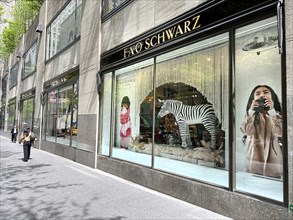 FAO Schwarz store, building exterior and sidewalk scene, Rockefeller Center, New York City, New