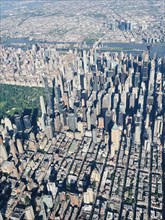 Aerial view of midtown Manhattan, Central Park and Upper East Side in foreground and Roosevelt