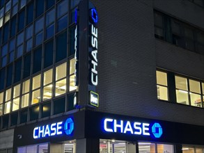 Chase retail bank office, building exterior at night, New York City, New York, USA