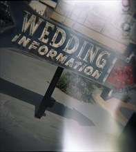 Light-streaked wedding information sign, Las Vegas, Nevada, USA