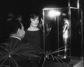 U.S. First Lady Jacqueline Kennedy viewing statuette Tutankhamun Exhibit with Egyptian