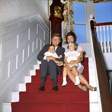 U.S. President John Kennedy and First Lady Jacqueline Kennedy sit with their children, John