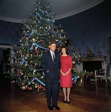 U.S. President John F. Kennedy and U.S. First Lady Jacqueline Kennedy standing in front of