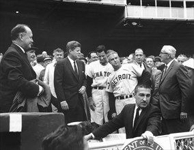 U.S. President John F. Kennedy talking with James “Mickey” Vernon, manger of the Washington