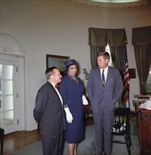 U.S. President John F. Kennedy visiting with American singer Marian Anderson and her accompanist