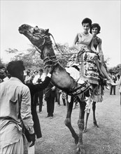 U.S. First Lady Jacqueline Kennedy with her sister, Princess Lee Radziwill of Poland, riding on