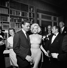 Steven E. Smith, brother-in-law of U.S. President John F. Kennedy, visiting with actress Marilyn