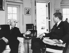 U.S. President John F. Kennedy (in rocking chair) meeting with Prime Minister of Australia, Robert