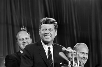 U.S. President John F. Kennedy delivering remarks to Democratic precinct captains during a