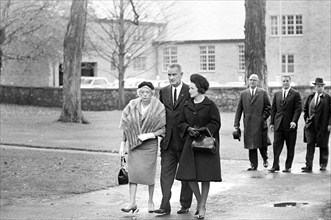 U.S. Vice President Lyndon Johnson and his wife Claudia "Lady Bird" Johnson (right), attending