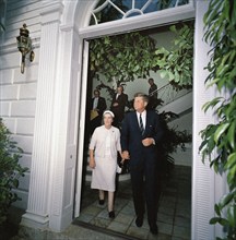 U.S. President John F. Kennedy and Foreign Minister of Israel, Golda Meir (center left), depart