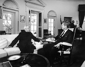 U.S. President John F. Kennedy (in rocking chair) meeting with President of India, Dr. Sarvepalli