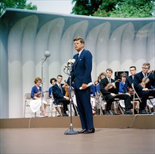 U.S. President John F. Kennedy delivering remarks during performance of Central Kentucky Youth