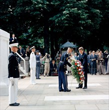 U.S. President John F. Kennedy placing wreath at Tomb of the Unknown Soldier during Memorial Day