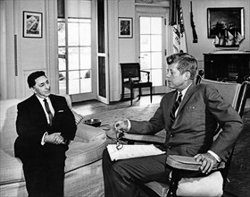 U.S. President John F. Kennedy (in rocking chair) meeting with newly-appointed Ambassador of