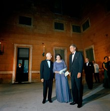 U.S. President John F. Kennedy standing with President of Italy, Antonio Segni (left), and wife,