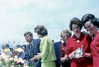 U.S. President John F. Kennedy (center left) with his sister Eunice Kennedy Shriver (center right)