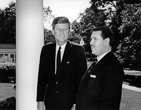 U.S. President John F. Kennedy meeting with Prime Minister of Libya, Mohieddin Fikini, west wing