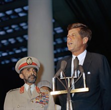 U.S. President John F. Kennedy delivering remarks during arrival ceremony in honor of Emperor of