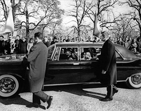 Caroline Kennedy and John F. Kennedy, Jr., riding in limousine in the funeral procession of U.S.