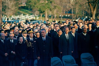 U.S. President Lyndon B. Johnson attending graveside services in the state funeral of U. S.