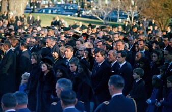 Members of the Kennedy family and others attend graveside services in the state funeral of