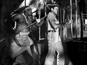 Mike Connors (right), on-set of the film, "Voodoo Woman", American International Pictures, 1957