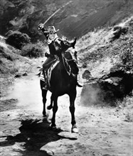 Audie Murphy, on-set of the western film, "Apache Rifles", 20th Century-Fox, 1964