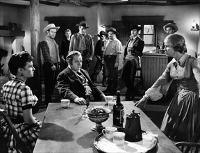 Myron Healy, Gilbert Roland, on-set of the western film, "Apache War Smoke", MGM, 1952