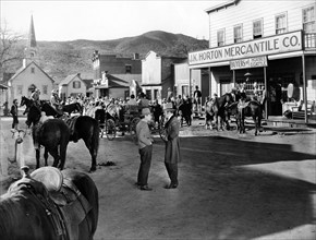 Street scene, on-set of the western film, "The Avenger", Columbia Pictures, 1931