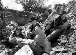 Arthur Kennedy, Dennis Morgan, Wayne Morris, on-set of the western film, "Bad Men Of Missouri",