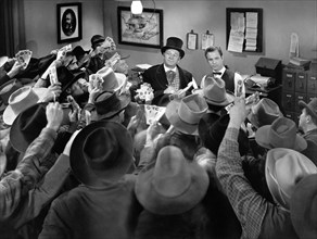 Wallace Beery, Bruce Kellogg, on-set of the western film, "Barbary Coast Gent", MGM, 1944