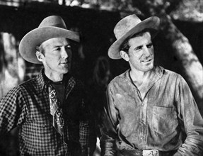 Don Gray (left), William Val (right), on-set of the western film, "Battling Marshal", Astor